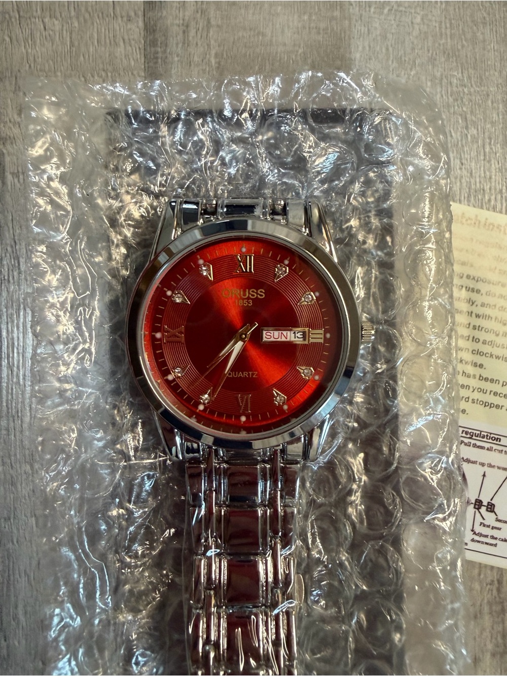 Russ Men's Red Dial Stainless Steel Bracelet Watch with Day-Date